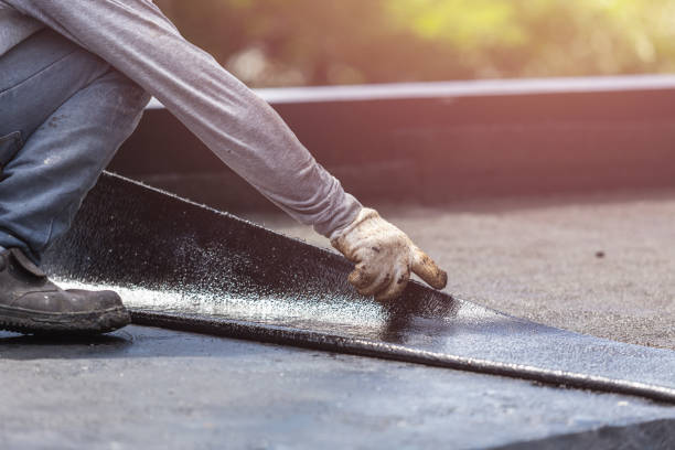 Professional Waterproofing technician working in Cecil, WI